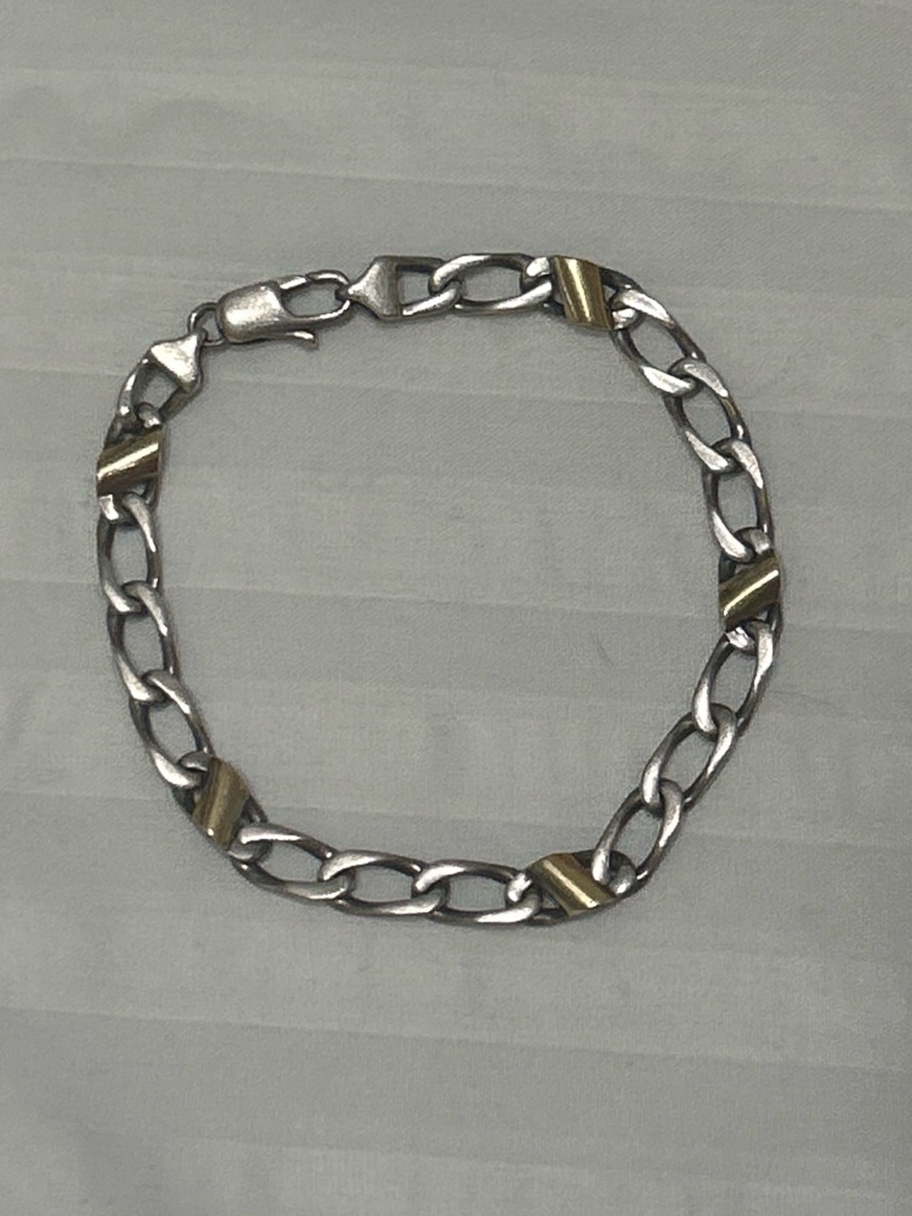 Tiffany & Co. 18k gold and sterling silver flat curb link chain bracelet